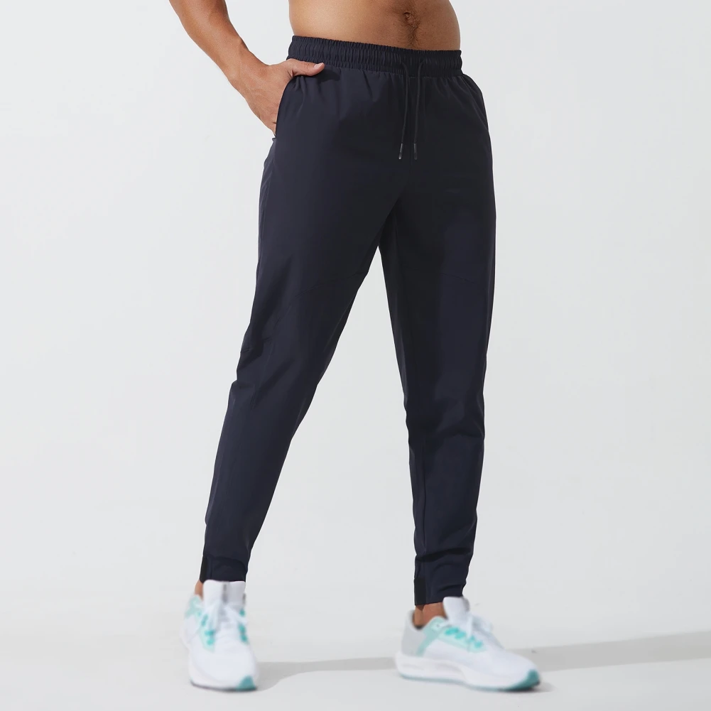 

Men's Running Pants Stretch Large Pocket Body Building Motion Loose Waist Strape Casual Woven Pants