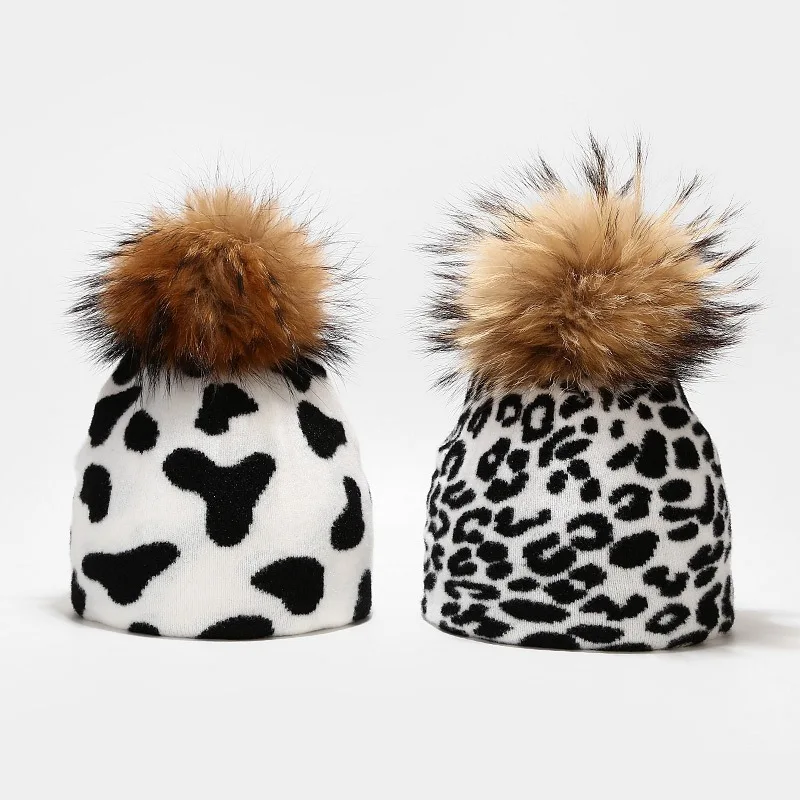 

Hot selling cow leopard pattern knitted hat women autumn winter outdoor warm cap real wool ball wool pullover hat free shipping