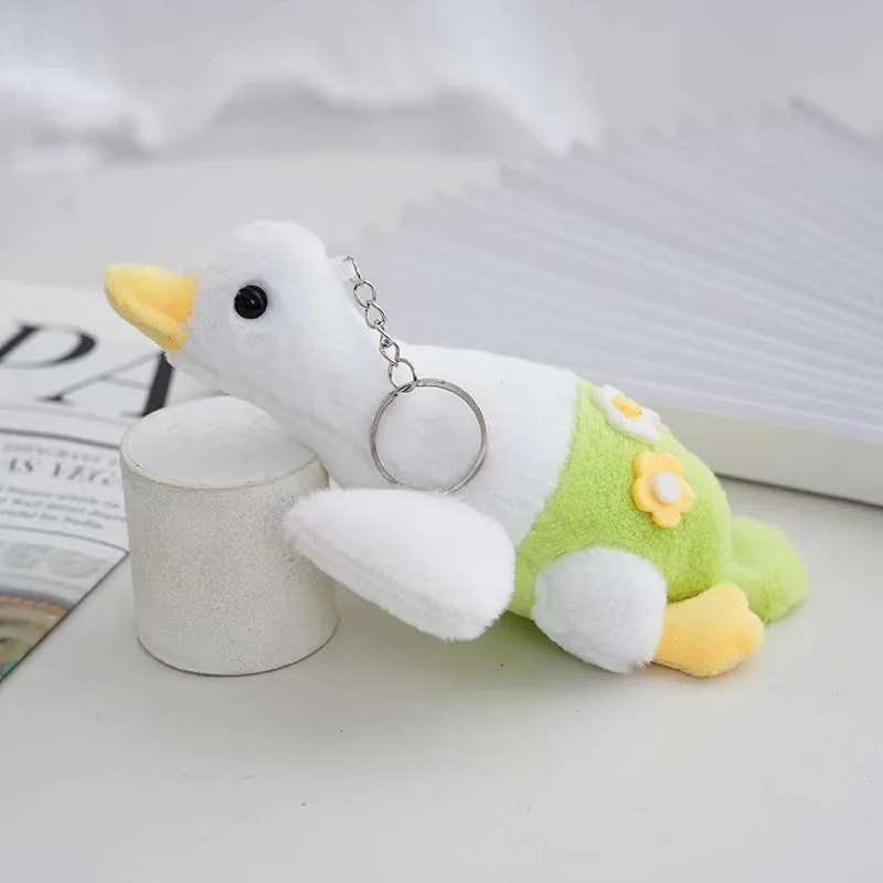 thumbnail image 1 of Lindo colgante de ganso con flores, juguete de peluche de dibujos animados, muñeco de ganso blanco grande, bolso colgante, llavero de muñeca, 1 of 4