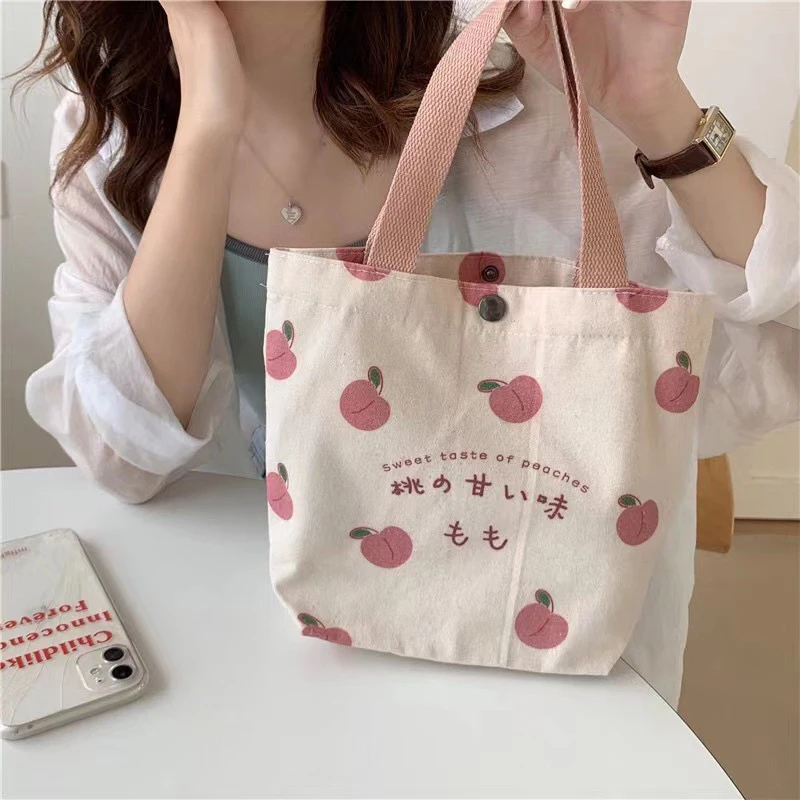 

Small Canvas Women Tote Food Bag Japanese Peach Hand Lunch Bag Korean Mini Student Handbags Cotton Cloth Picnic Travel Bento