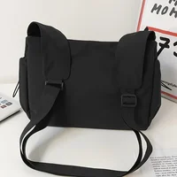 Fashionable Crossbody Bag with Drawstring Accent - Spacious & Secure Zipper Closure - Includes Stylish Bag Charm - Image 4