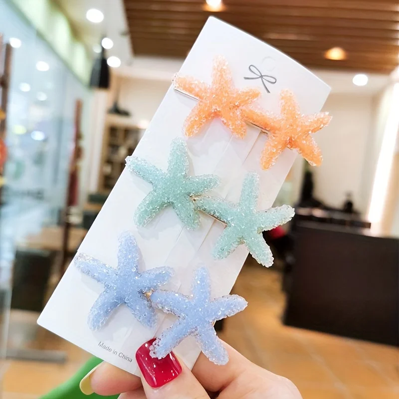 Een prachtige haarspeld in de vorm van een zeester voor dames, perfect voor een zomerse strandlook, ideaal voor..._voghion.com