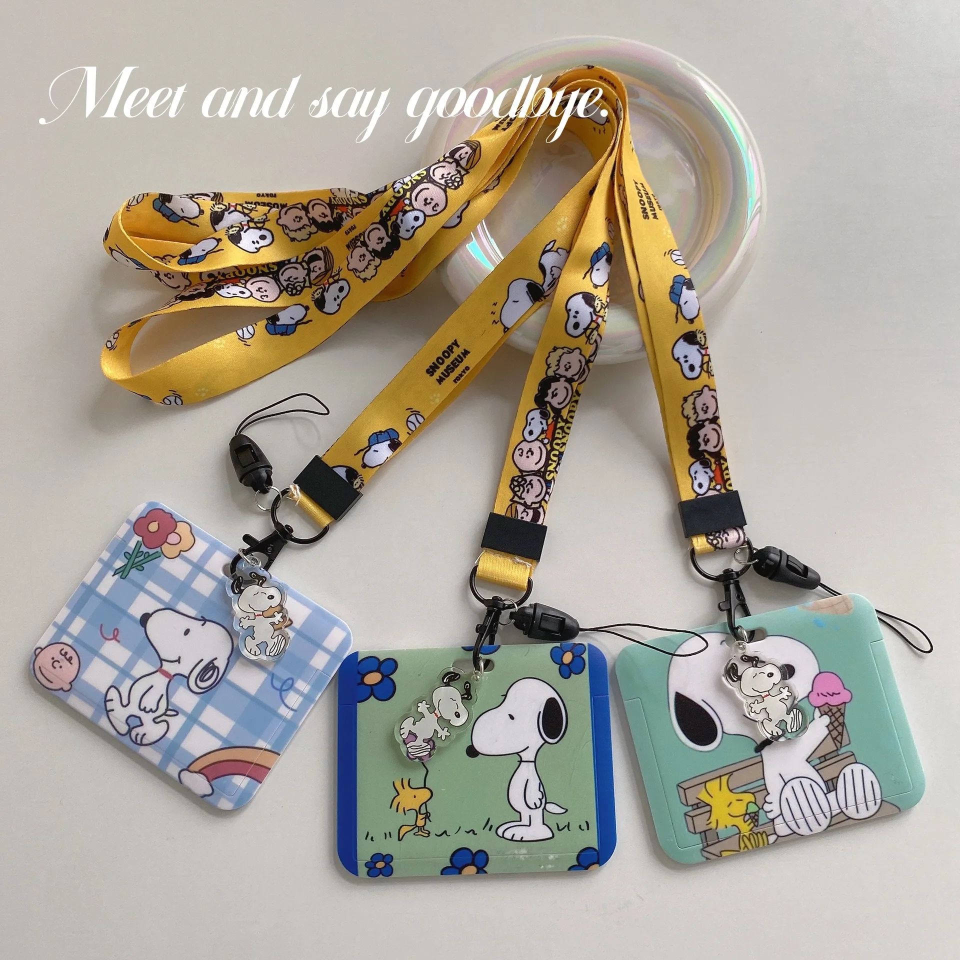 Snoopy on dog house badge holder with retractable reel