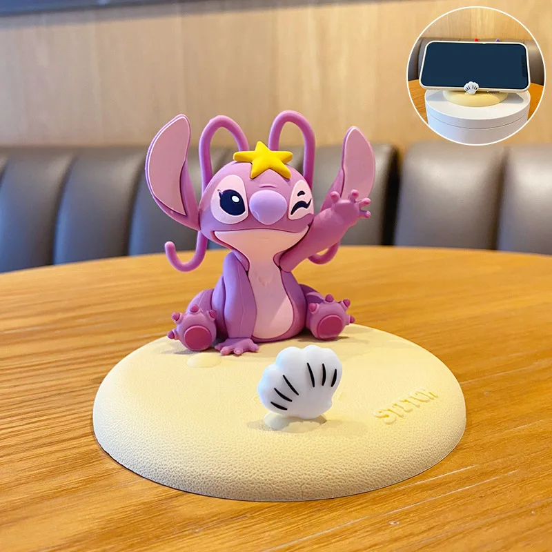 thumbnail image 1 of Nueva figura de Disney Lilo & Stitch, lindo soporte para teléfono móvil, soporte para teléfono de Stitch, soporte de escritorio con agarre Tok, soporte para teléfono móvil, regalos de cumpleaños, jugu, 1 of 5
