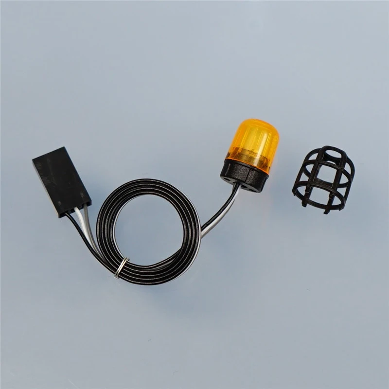 Lampe d'ingénierie LED rotative 360° pour camion RC Tamiya Lesu Scania Man Actros Volvo, vue de côté avec le mécanisme de rotation visible.
