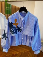 Chemisiers amples et polyvalents à la mode, chemises à col rond brodé à manches longues pour femmes, nouvelle collection printemps été 2026 3