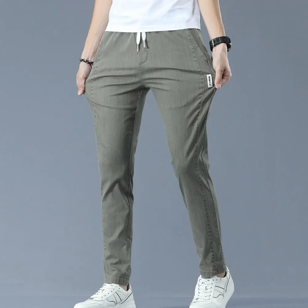 

Slim Fit Drawstring Pants Solid Color Men Pants Slim Fit Men's Streetwear Trousers Elastic Waistband Drawstring Slant for Casual