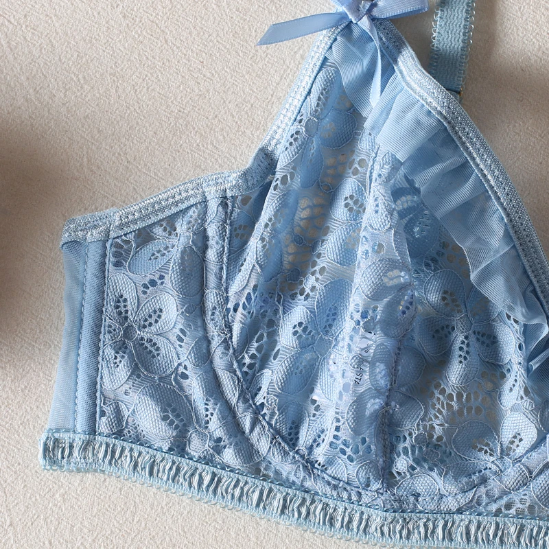 Romantic lingerie look with floral lace, sheer texture, and playful styling