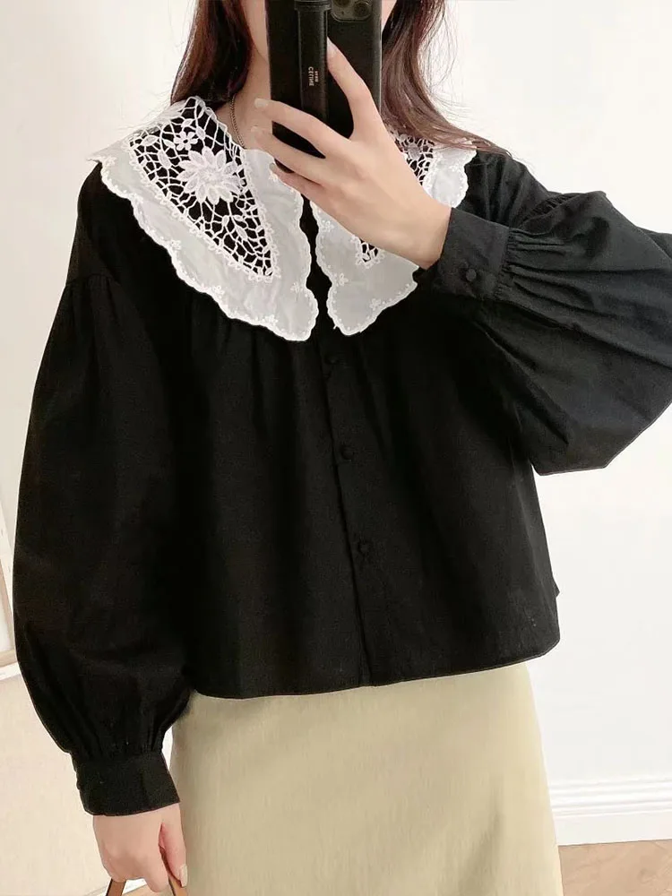 

Autumn new women's fashion in Europe and the United States casual wild trend buttons hollow embroidery shirt