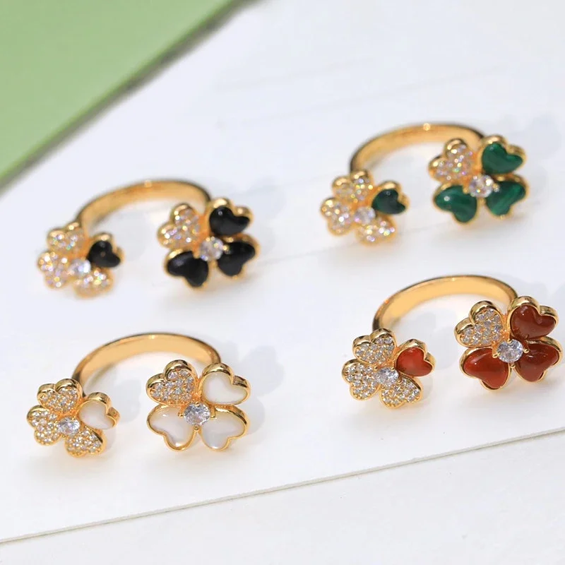 

Женское кольцо из розового золота, с четырьмя лепестками