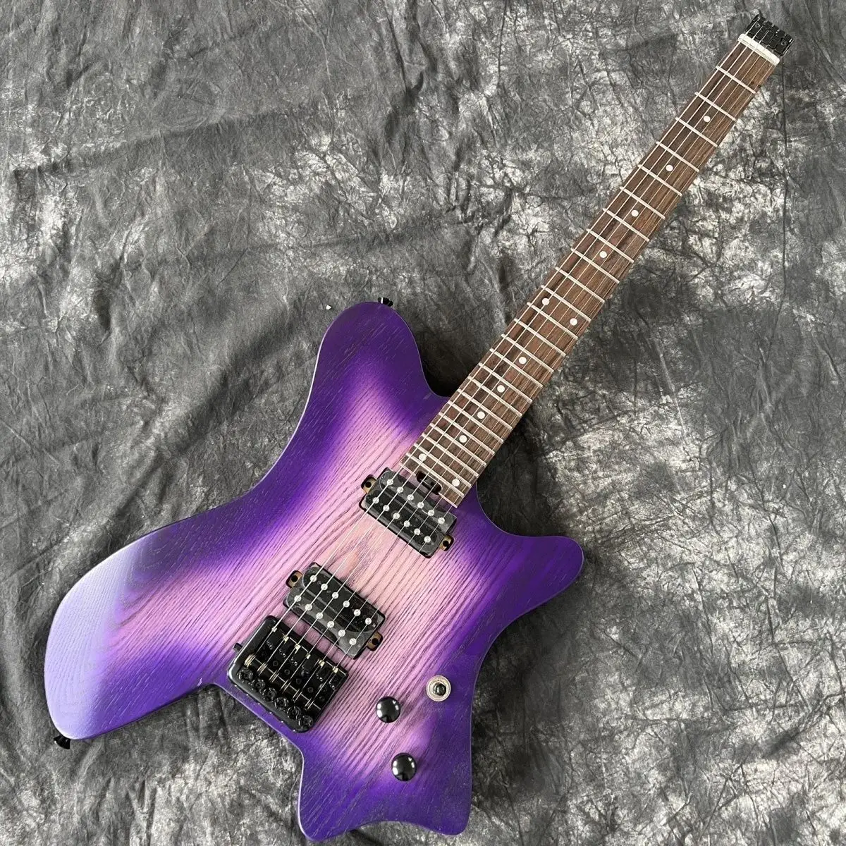 

Hot Sale Factory Customization Headless Electric Guitar Purple Ash Wood