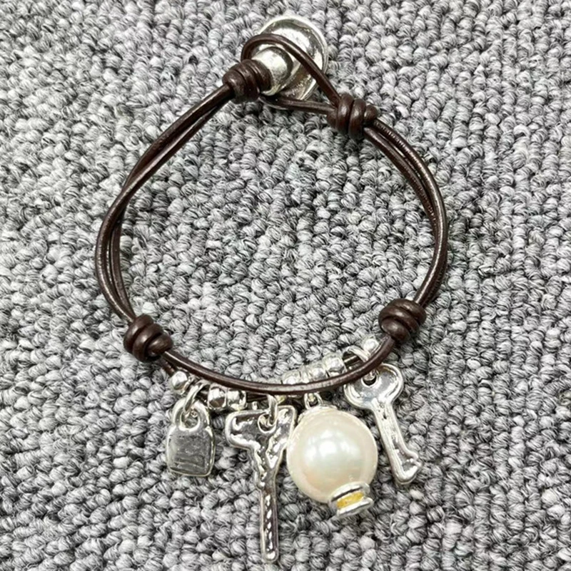 

Европейский и американский Оригинальный модный гальванический серебряный браслет 925 пробы с черными веревками и жемчужными ключами ударопрочный браслет уникальные ювелирные изделия в подарок