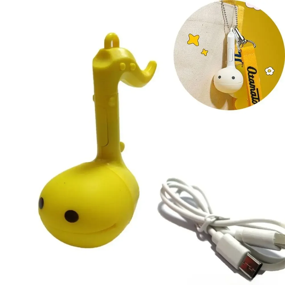 צעצוע מוזיקלי אלקטרוני בגודל מיני עם חור תלוי קרטון מחזיק מפתחות אלקטרוני צעצוע מוזיקלי 10 שירים כיף