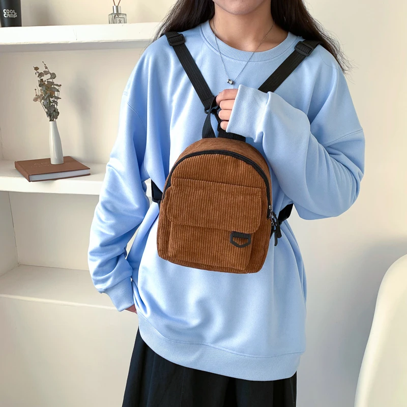 Mini sac à dos en velours rayé minimaliste et polyvalent pour étudiants et femmes pour les voyages de loisirs