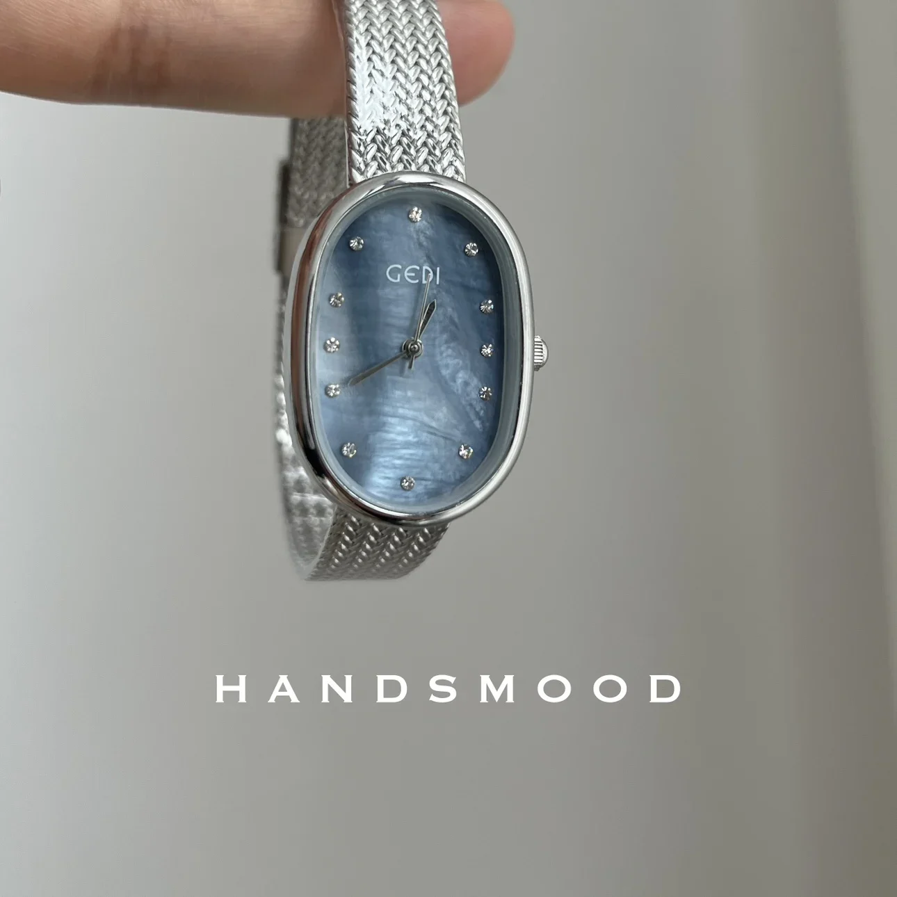 

Elliptical niche fashionable temperament Beimu face silver high-end feeling minimalist quartz women's watch watch