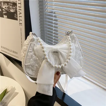 Borsa femminile di perle Borsa a tracolla di design retrò di lusso Borse a tracolla con fiocco Borse a tracolla di tendenza 2023 da donna in tela di moda 1