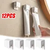 12 Pieces Toothpaste Holder No Punch Facial Wash Holder Bathroom Wall Mounted Multifunctional Toothpaste Holder 1