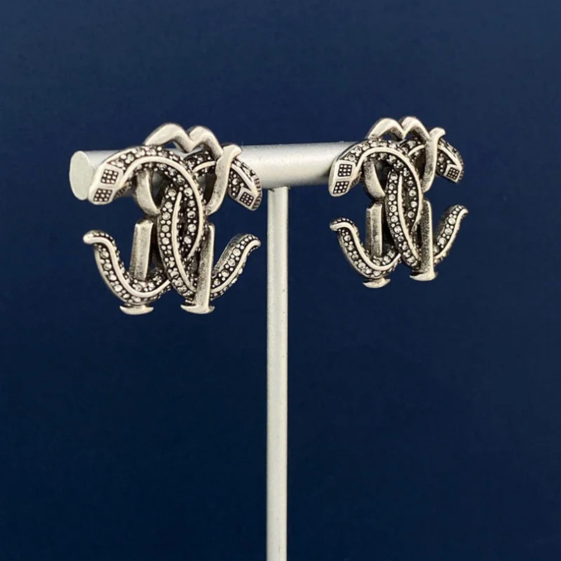 Donia Jewelry European and American Fashion Titanium Steel Micro-Inlaid AAA Zircon Double Snake Silver Needle Luxury Earrings