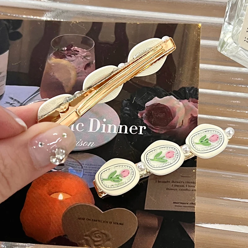 Рисунок 4 - Заколка для волос с жемчугом в виде тюльпана