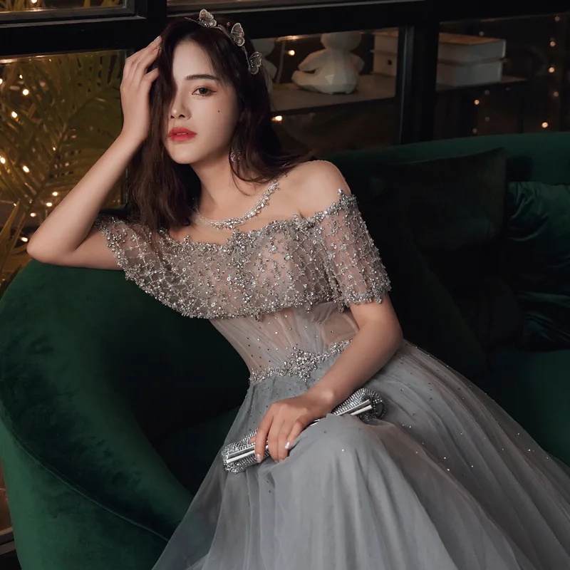 فساتين سهرة بدون حمالات برقبة واسعة ، مزينة بزينة...