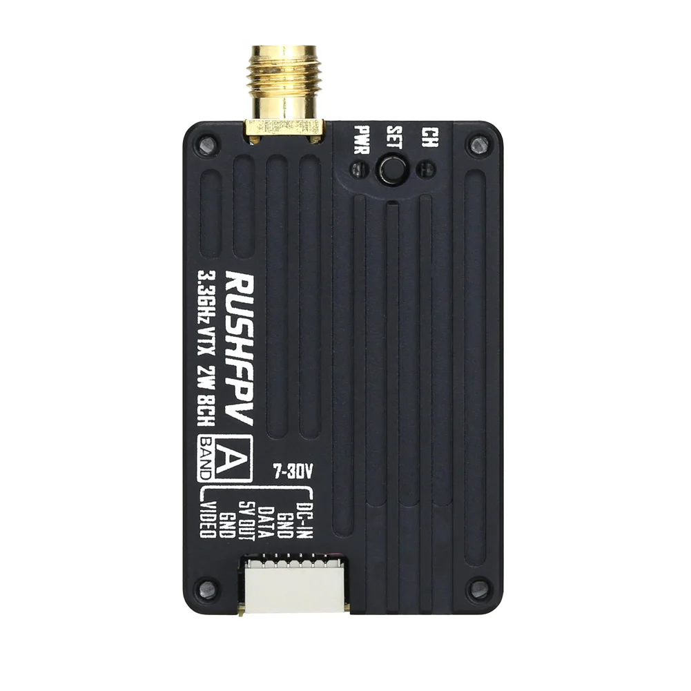 Module émetteur RUSHFPV 3.3G 2W VTX avec DVR et antenne, posé sur une surface de travail avec câbles.