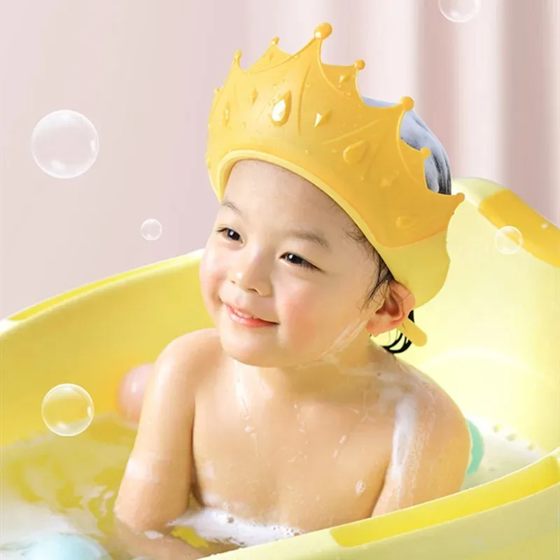 Front view of a silicone shampoo hat designed to protect a child’s eyes and ears during bathing