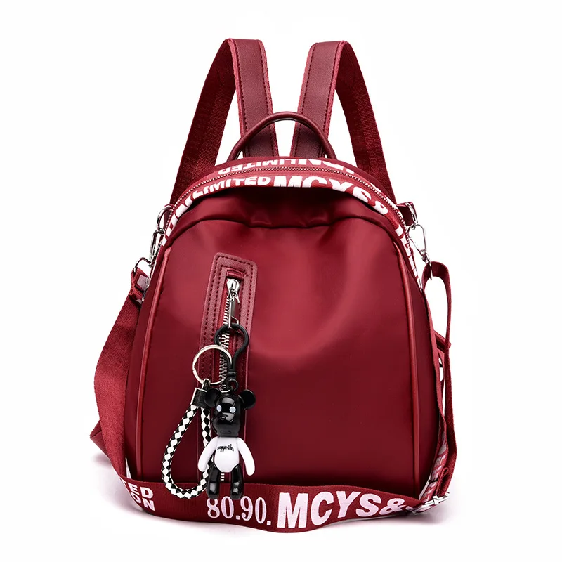 

Women's fashion backpack solid color Oxford cloth college wind school bag travel trend shoulder bag