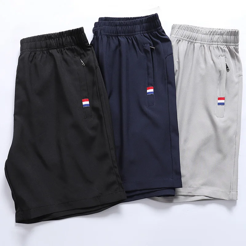 

Summer Men's Ice Silk Shorts Loose Fitting Quick-Drying Sweatpants Classic Tri-Color Label Zipper Pocket Bermuda Beach Pants 8XL