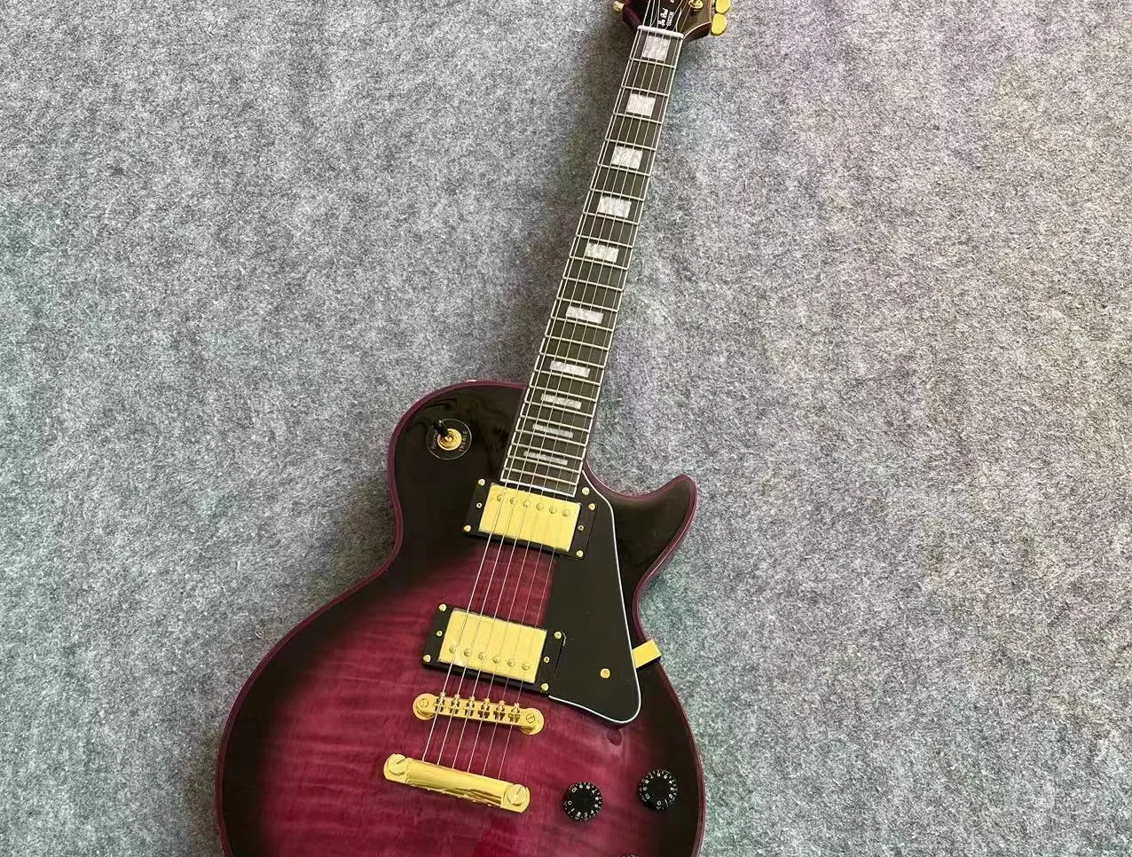 

2024 The factory has inventory of top quality Paul rosewood body rosewood fingerboard flame standard solid electric guitar GDSGD