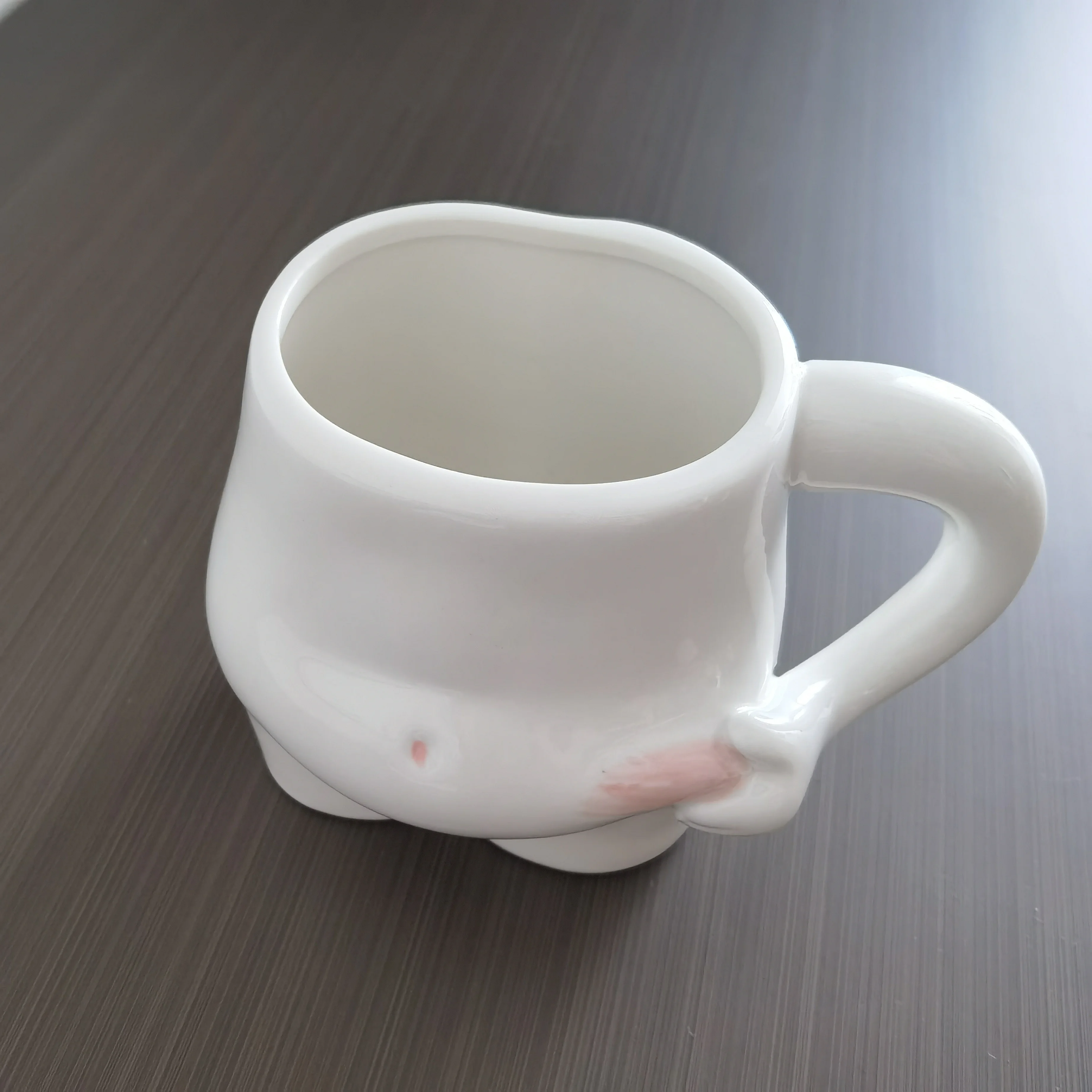 https://ae01.alicdn.com/kf/Sb1bf117992414712a30fcce8a830e8b5v/Creative-Pinch-Belly-Mugs-Coffee-Cups-Kawaii-Ceramic-Mug-Cute-Coffee-Cup-Milk-Tea-Water-Cups.jpg