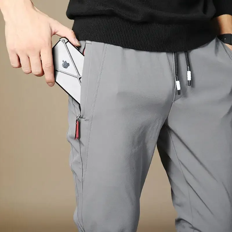 thumbnail image 1 of Pantalones casuales finos y frescos para hombre, pantalones de verano de seda de hielo refrescante, pantalones para hombre de diseñador, tallas grandes, estilo coreano, ropa de calle grande, 1 of 5