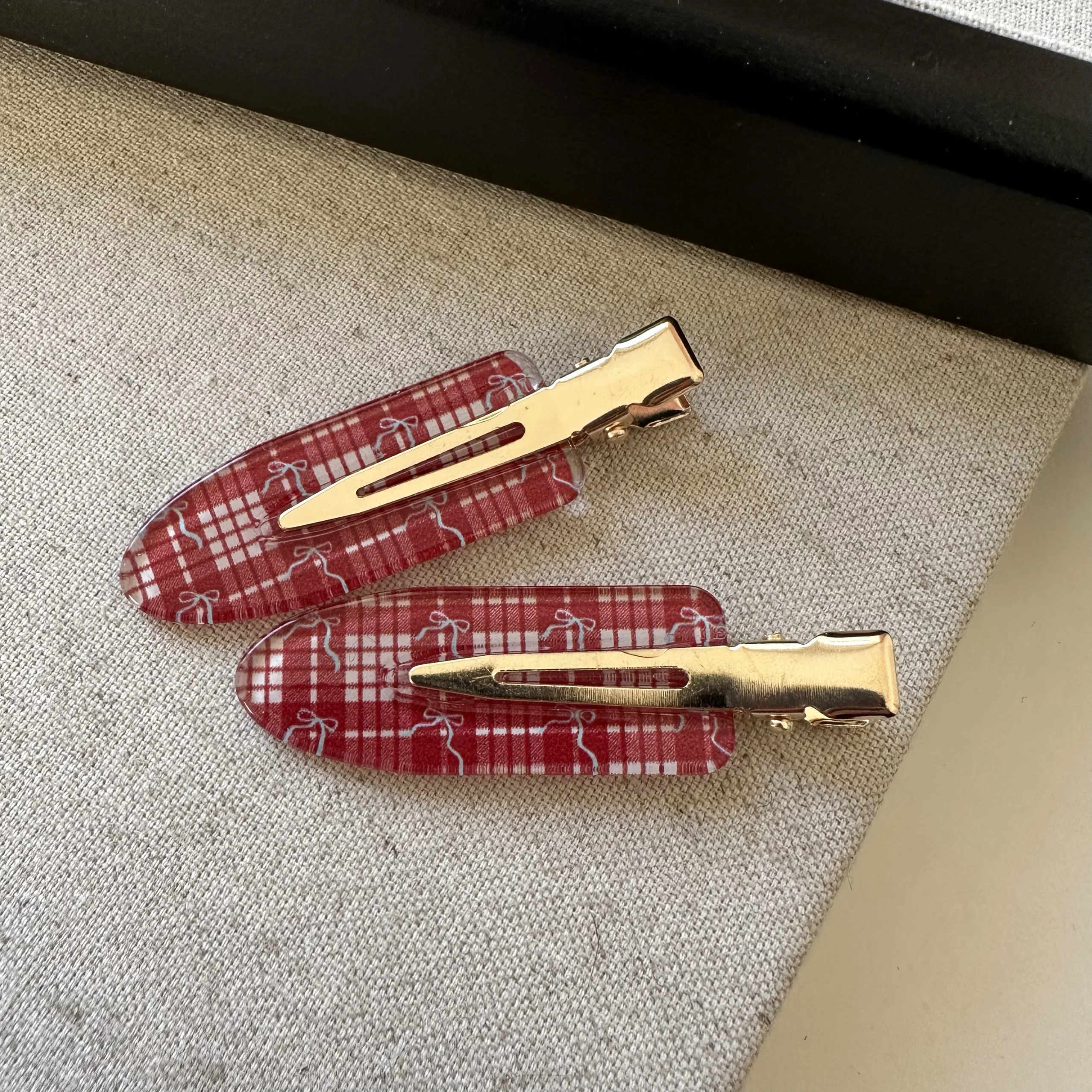 A pair of red and white small plaid