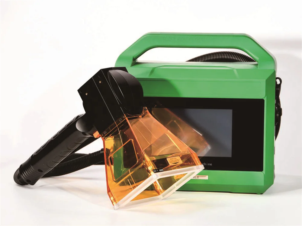 Hand held metal engraving machine