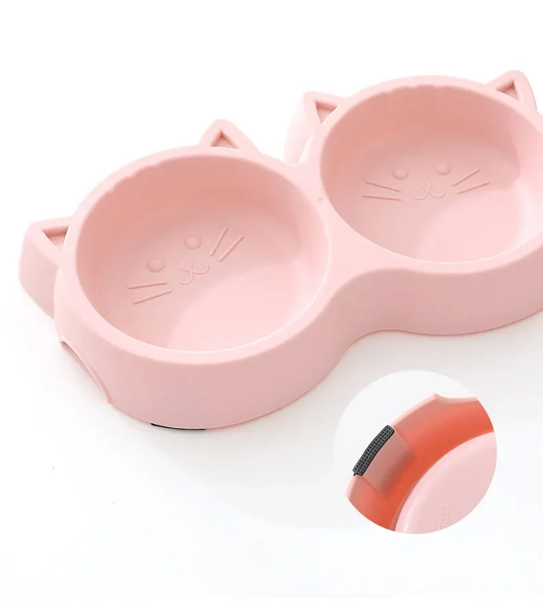 Ergonomic dual bowl station for cats and small pets.