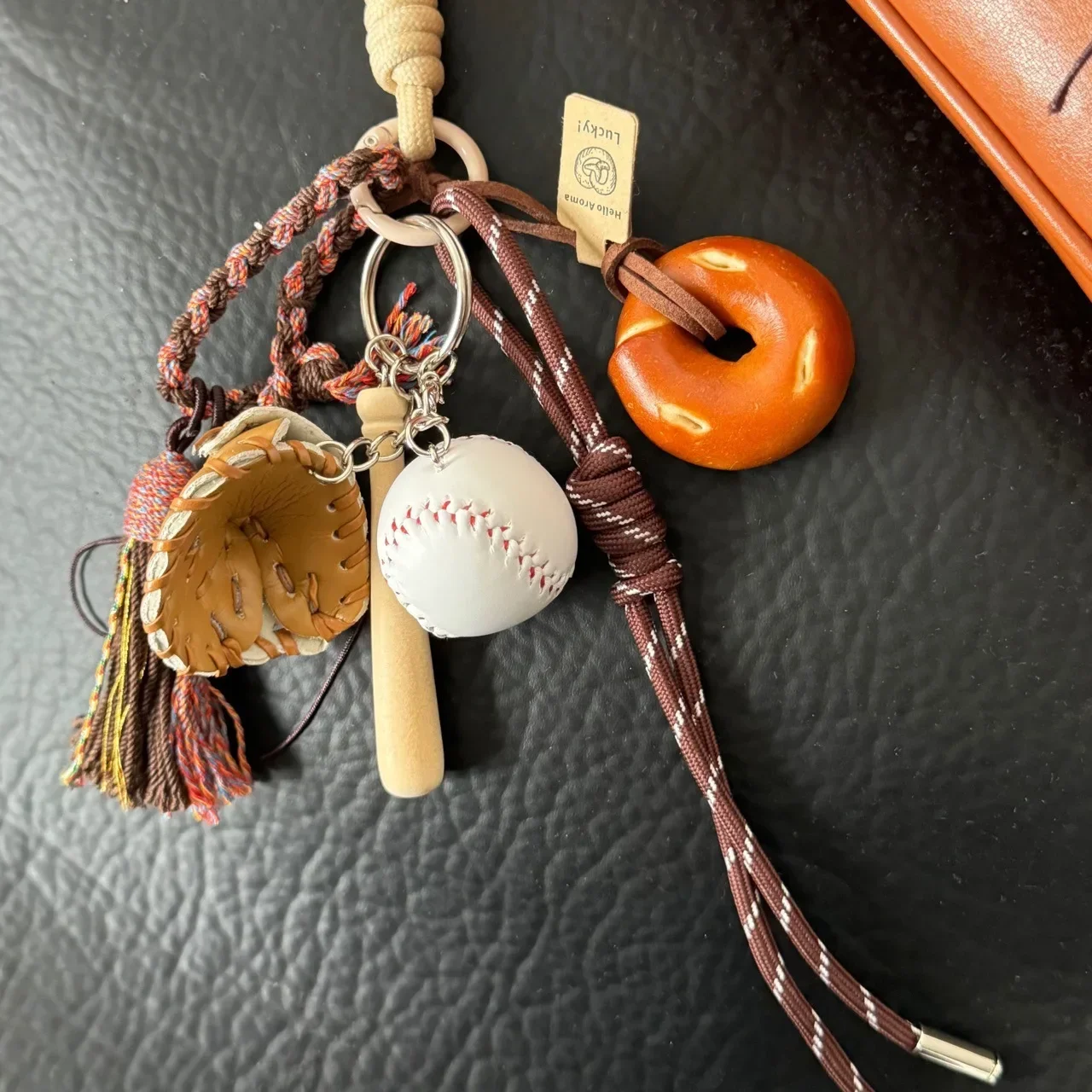 Leather bag charm on handbag