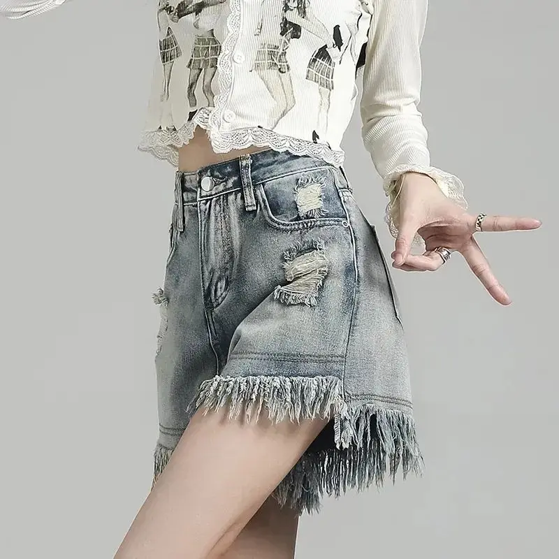Korean Fashion Female Tassel Spliced Denim Shorts Summer Womens Clothing Y2K Casual Hole Loose High Waist Distressed Shorts