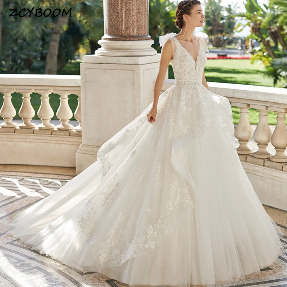 

Elegant V-Neck Appliques Zipper Wedding Dress 2023 Boho Mermaid Floor Length Court Train Open Back Spaghetti Straps Bridal Gown
