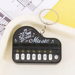 Mini Portable Electronic Keyboard Keychain - Compact Travel Piano (Black)