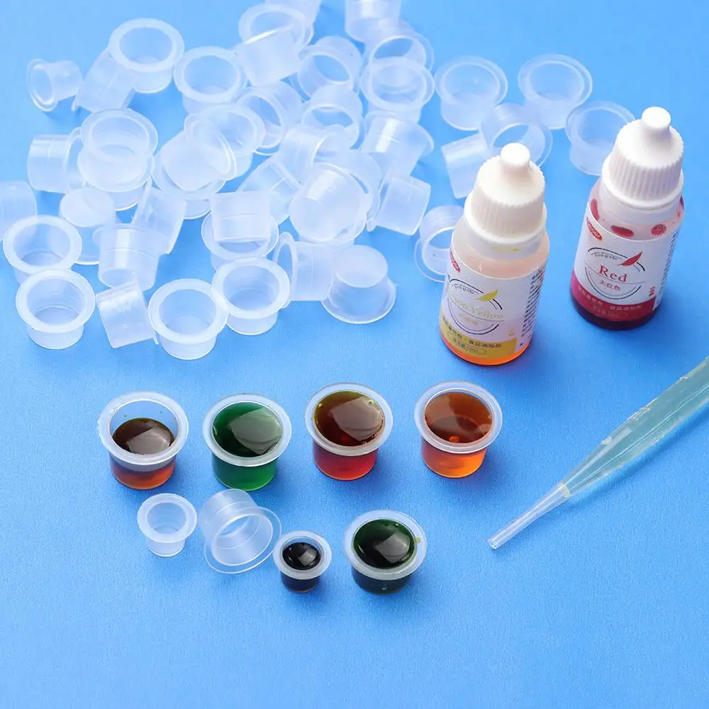 

100 Pieces Tattoo Ink Caps Disposable Plastic Cups Tattoo Pigment Cups for Pigment Cup Container Holder Makeup Tattoo Supplies