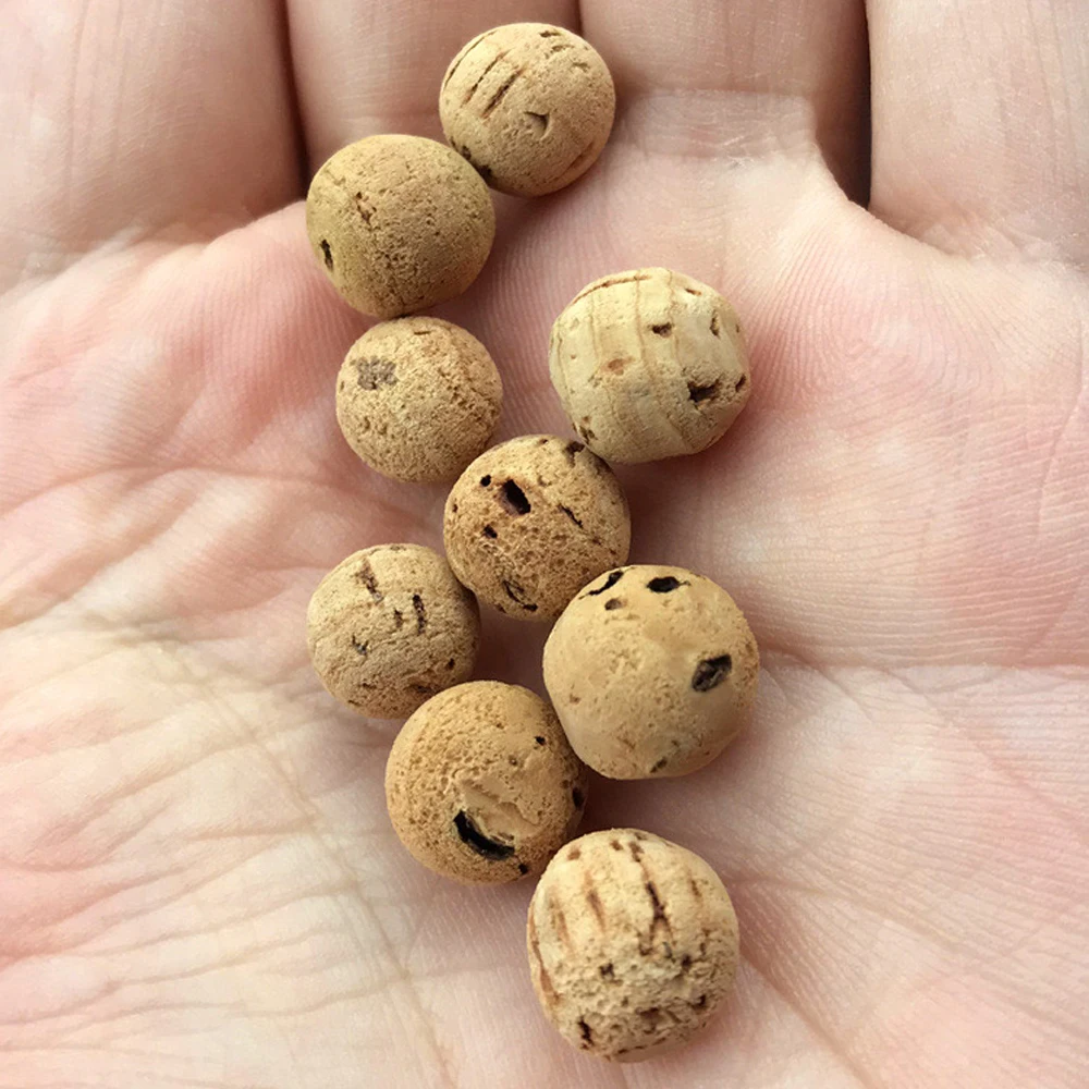 Description Picture 5 of item20x Floats Natural Cork Ball Unfill Beads Beans Carp Fishing Boilies No Smell Lure Floating Bottom Hair Rig Fishing Bait