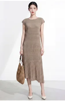 Abito Miyake, un vestito midi sofisticato ed elegante dal tocco di lusso leggero, perfetto per l'estate 2026.