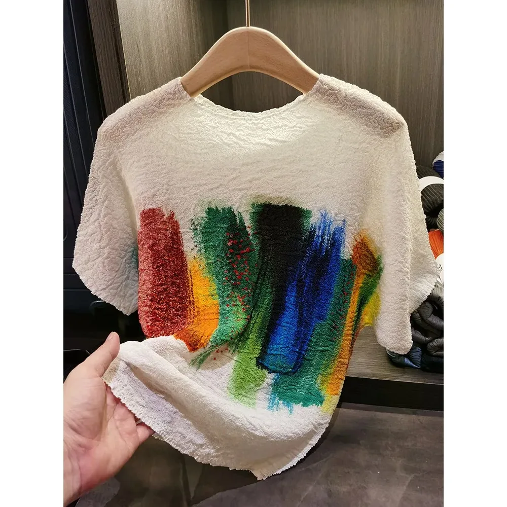 

MIYAKE Pleated Oil Painting Spelling Colorful Print Bat Sleeve T-shirt Female Summer New Peplum Thin Section Miyake Top