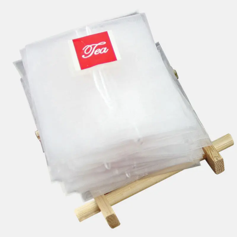 Disposable tea bags 100pcs/lot pyramid tea bags filter nylon teabags single string with label transparent empty