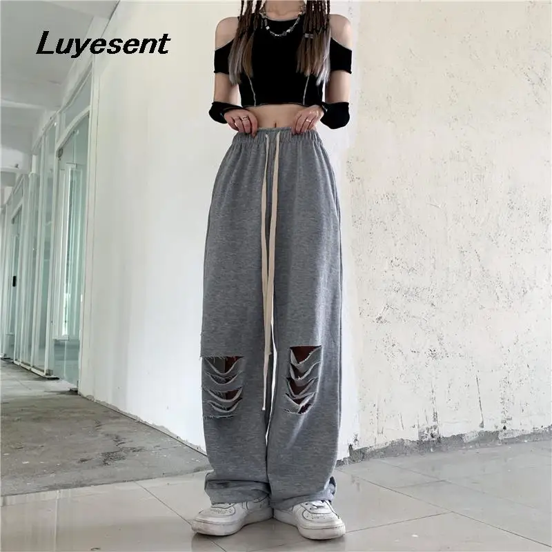 

Female Sport Street Long Wide Leg Pant 2023 Autumn Lady Hollow Out Hole Slit Draw String Elast Waist Pants Empire Gray Trouser