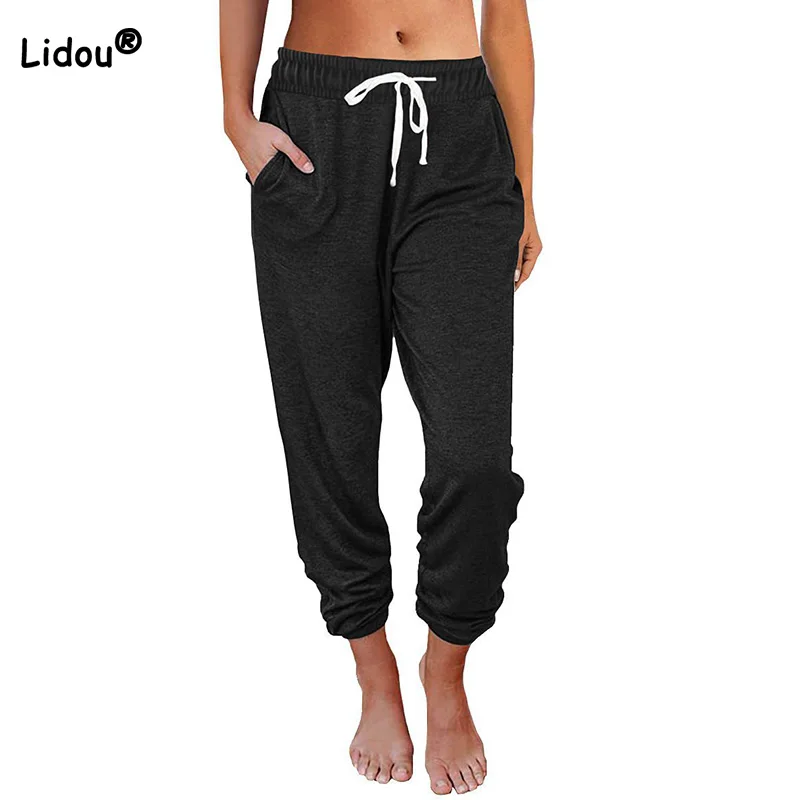 

Spring Summer New Fashion Women's Pants Casual Drawstring Loose Pocket High Waist Ninth Leggings Solid Pencil Trousers Female