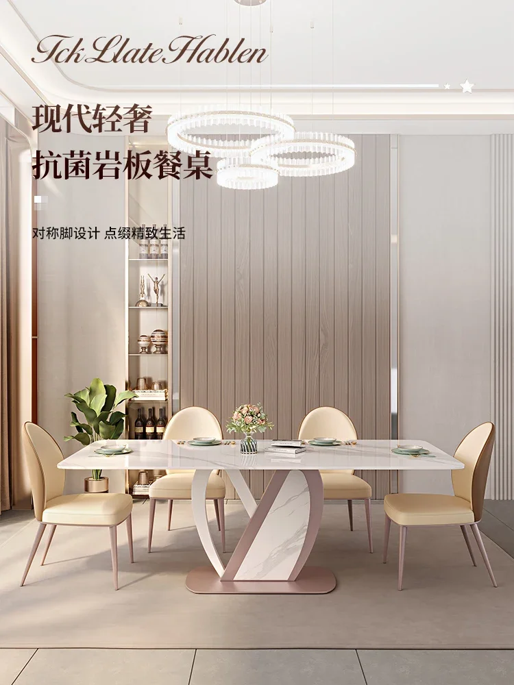 

Rock-board dining table is modern, simple, light and luxurious. 6 families use small apartment designer rectangular bright rice