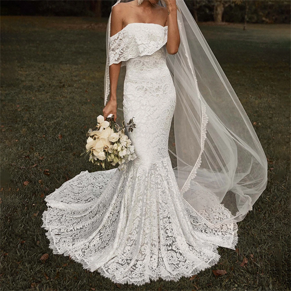 

Mermaid/Trumpet Elegant Bohemian Wedding Dresses Off-The-Shoulder Lace Appliqued Boho Wedding Dress Backless Beach Bridal Gowns
