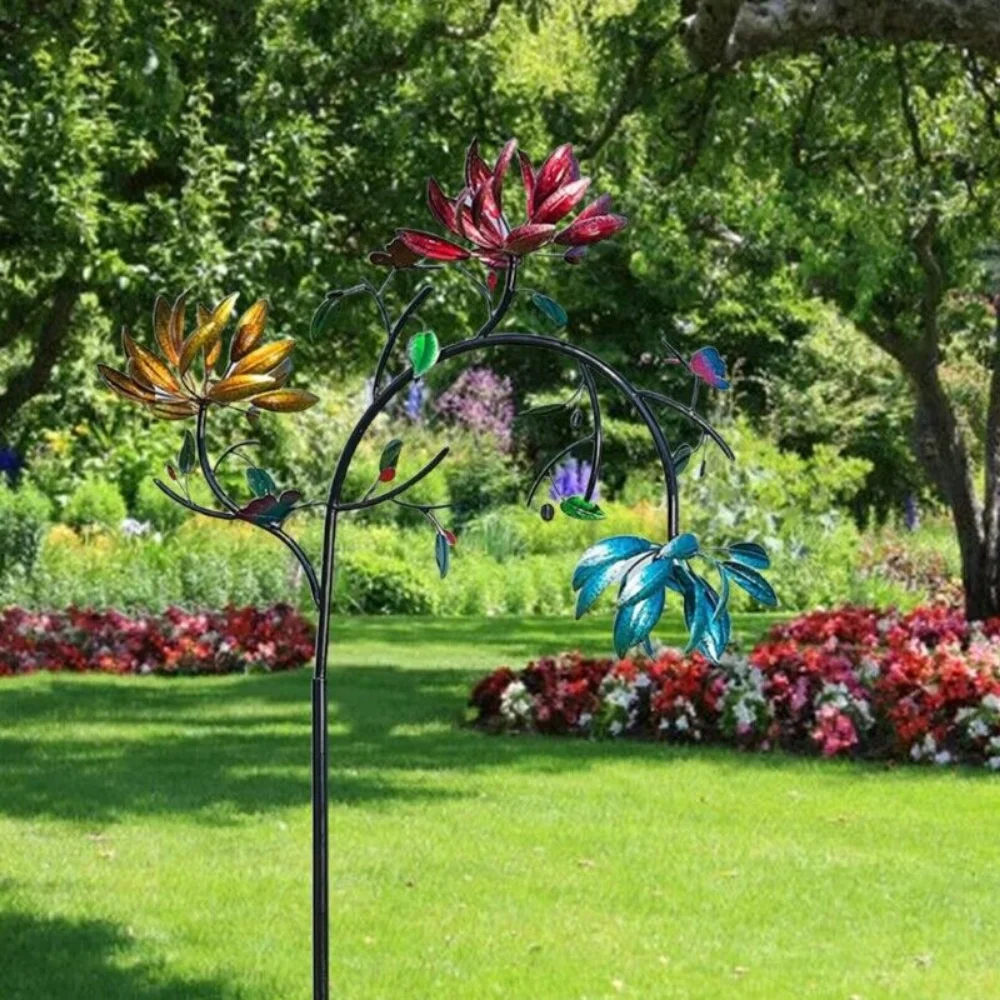 Duży metalowy obrotowy wiatrak kwiat motyl wiatraczek z wirującymi kwiatami kolorowy trawnik ogród artystyczna dekoracja na zewnątrz