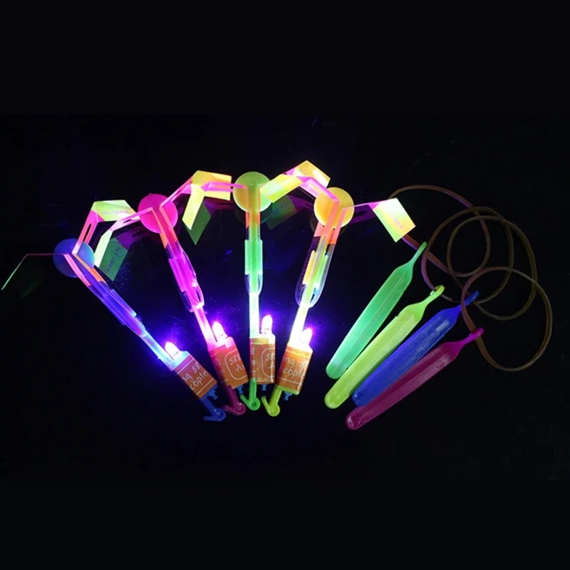 Flying Toy Outdoor Sport LED Light Arrow Rocket Helicopter Slingshot Aircraft Rubber Band Catapult Bamboo Dragonfly