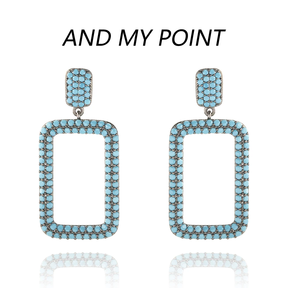 

Женские серьги-гвоздики с голубым ажурным опалом